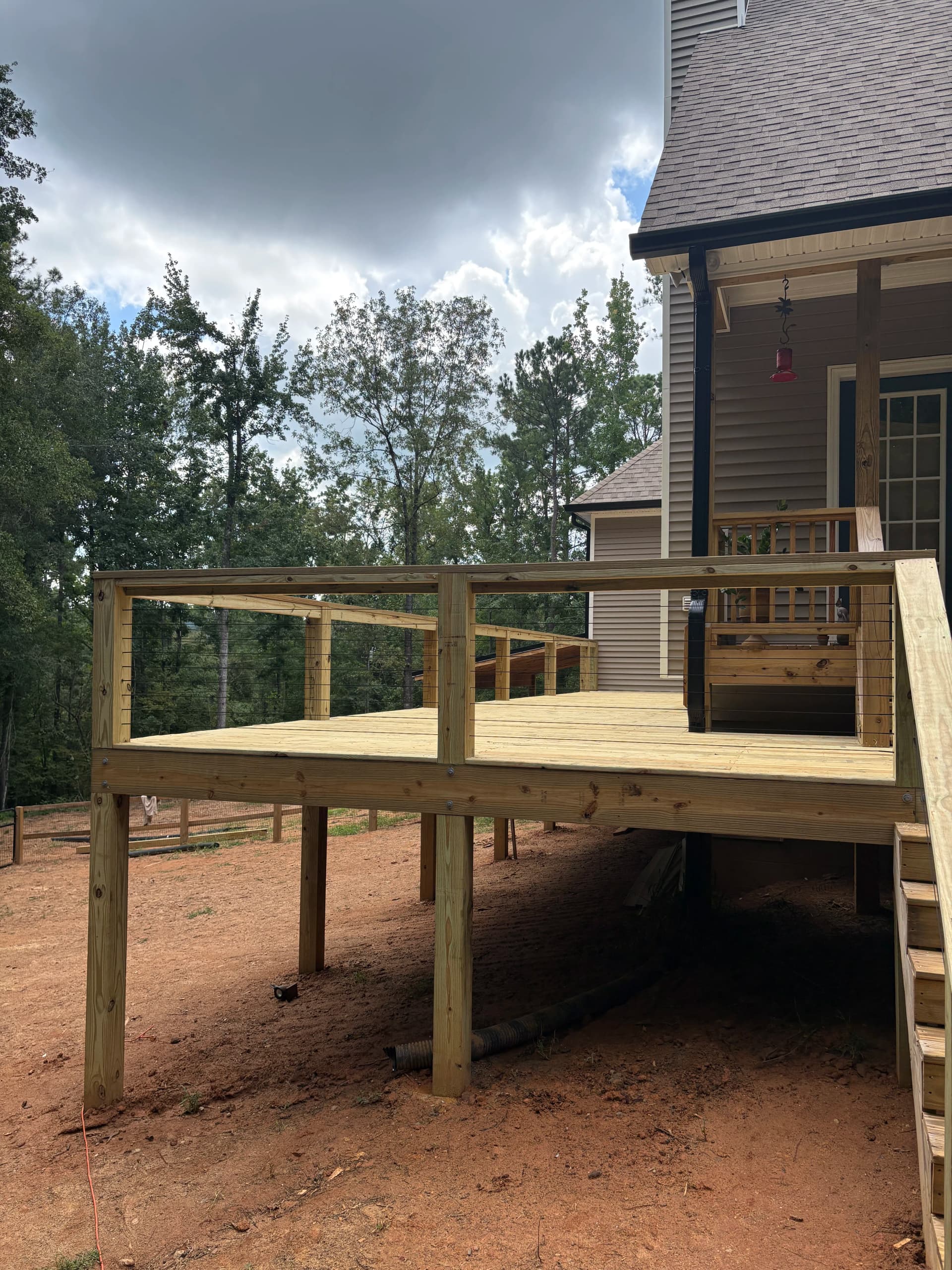 Spacious New Deck and Lean-To Cover Built for Year-Round Use