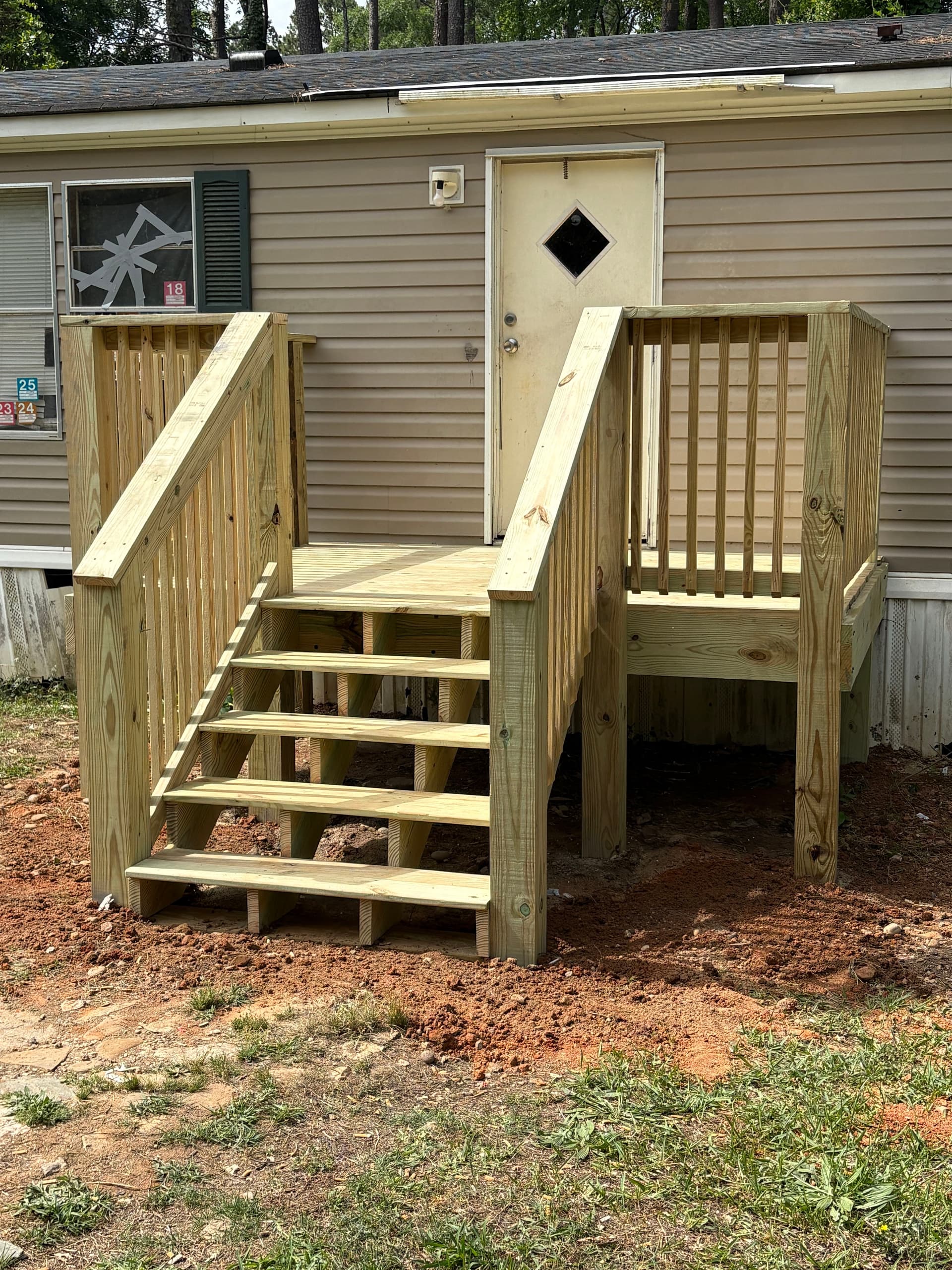 Old Rotting Entry Deck Replaced With Solid Pressure-Treated Build