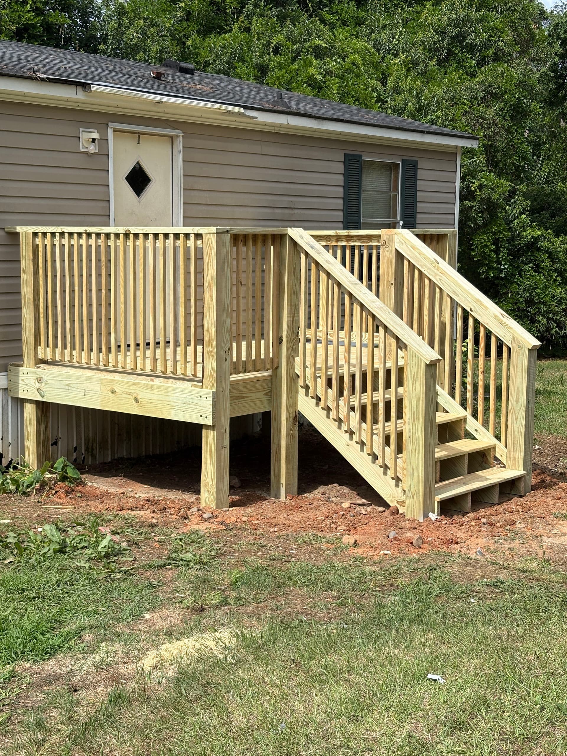 Old Rotting Entry Deck Replaced With Solid Pressure-Treated Build