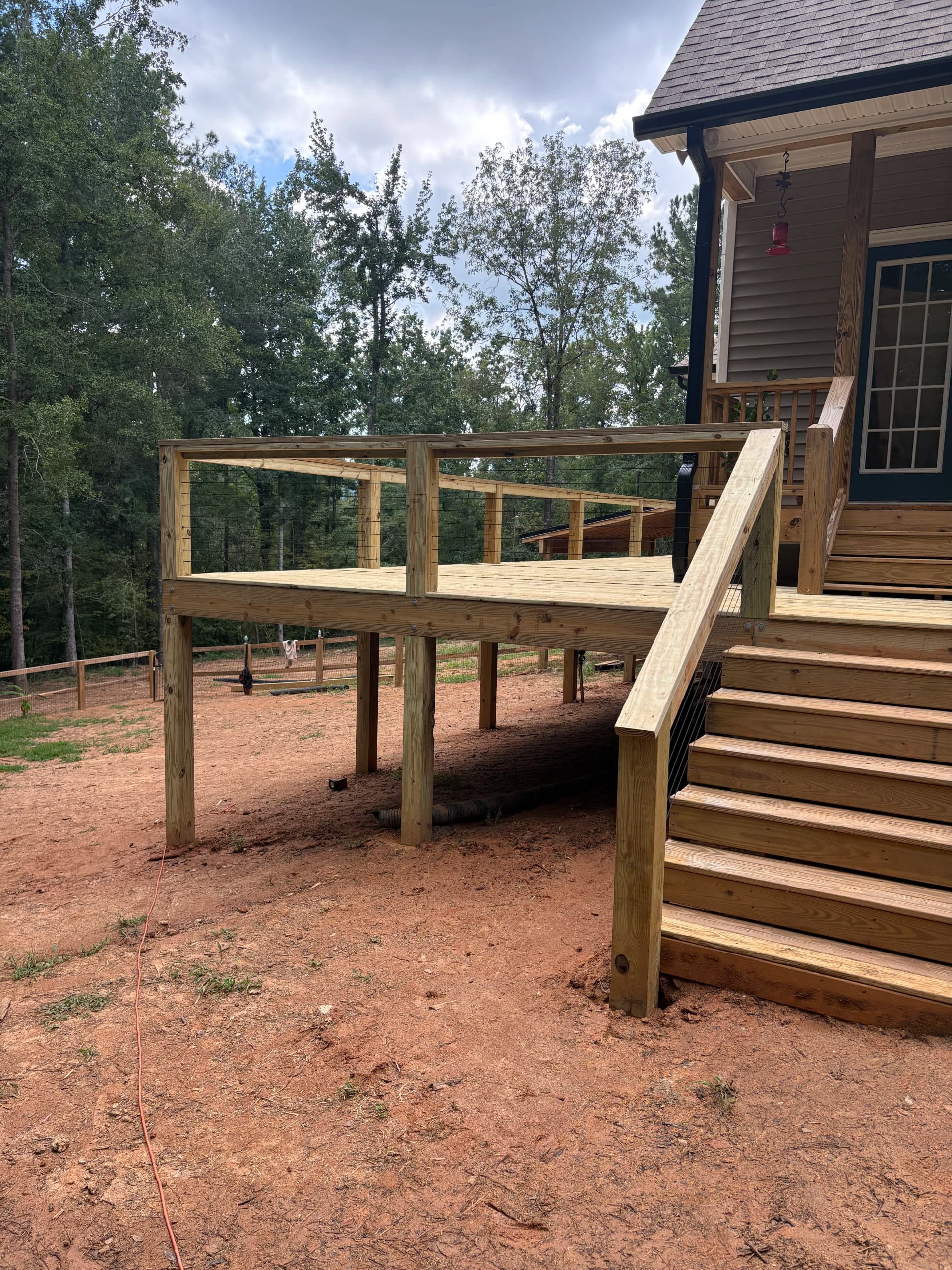 Spacious New Deck and Lean-To Cover Built for Year-Round Use