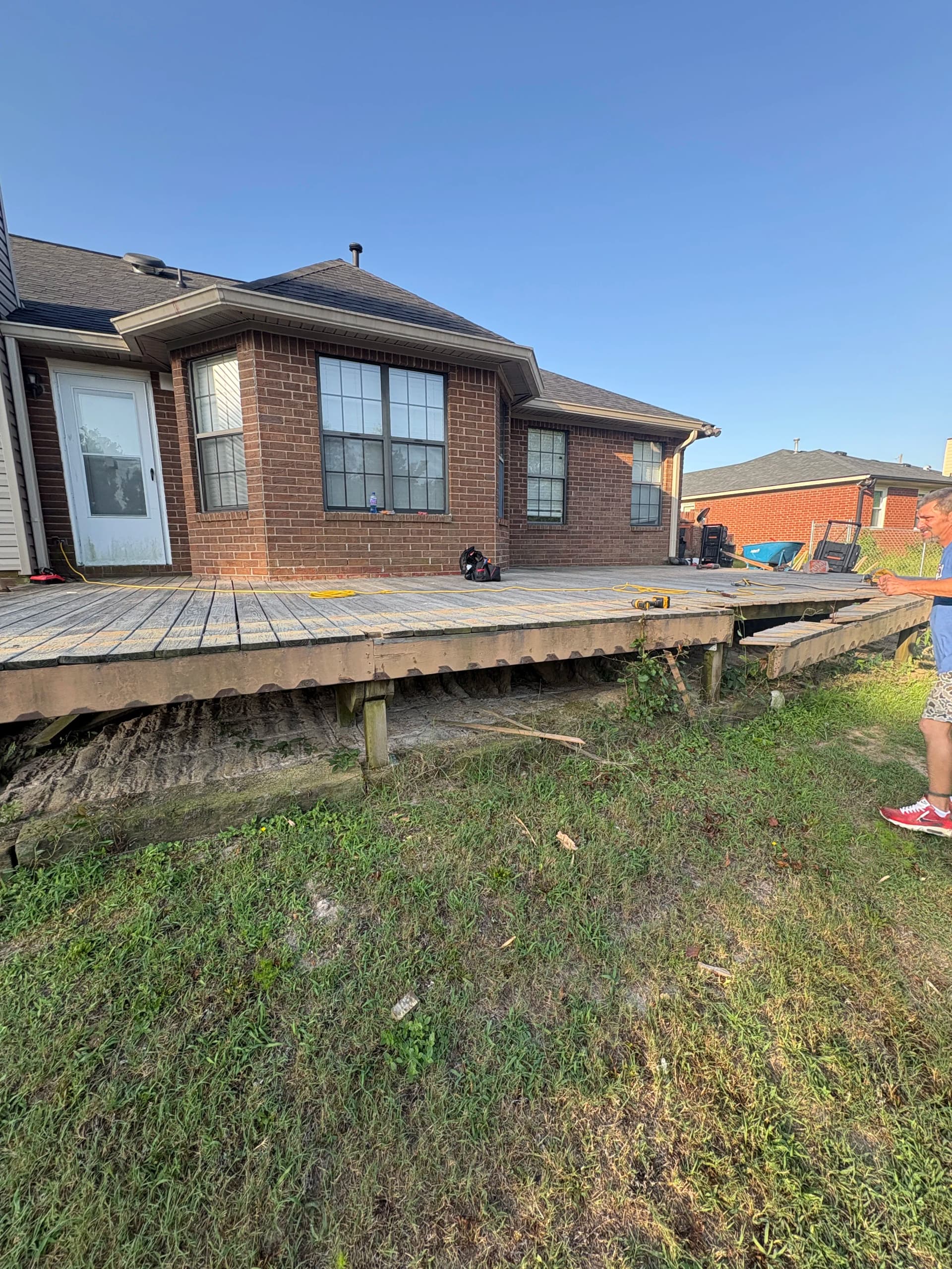 Worn Deck and Retaining Wall Demo Day Has Begun