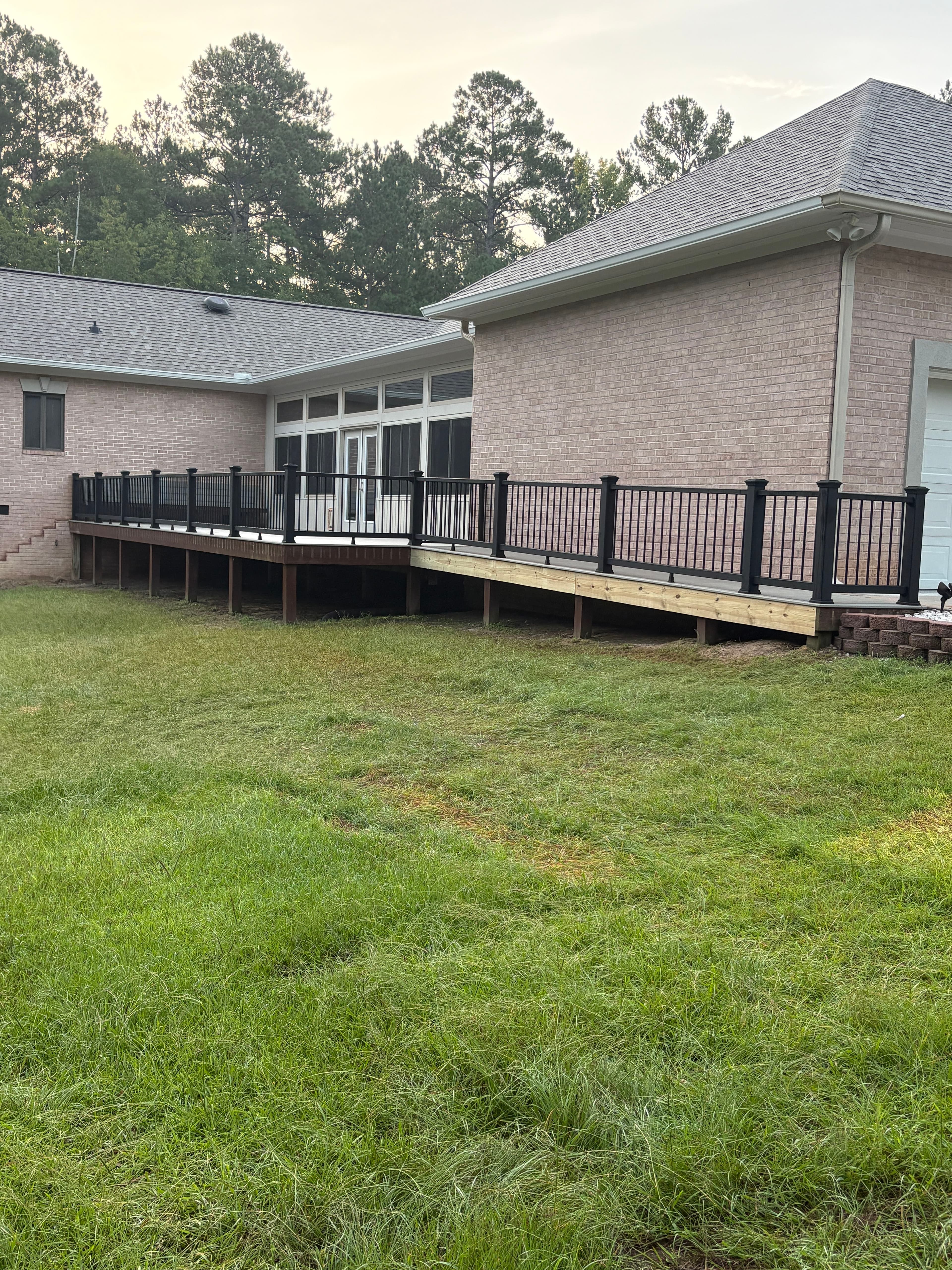 Project Deck Rebuild With Trex Decking and Black Composite Railing image