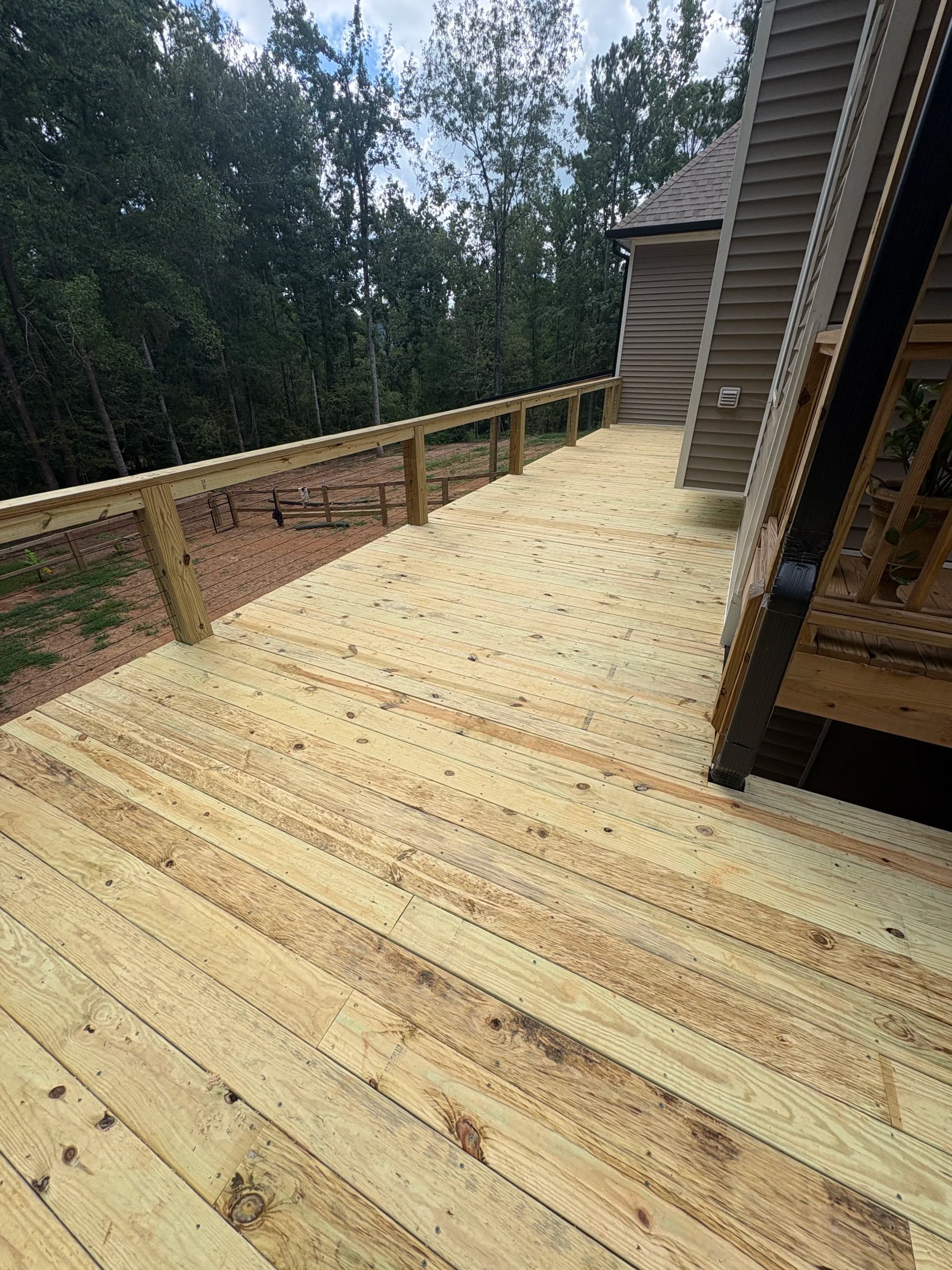 Spacious New Deck and Lean-To Cover Built for Year-Round Use