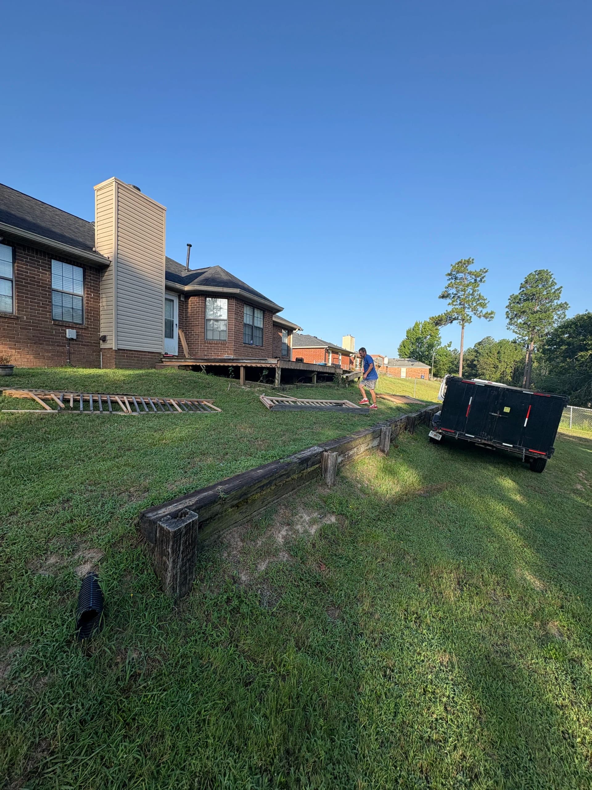 Gallery photos for Worn Deck and Retaining Wall Demo Day Has Begun: Image #1